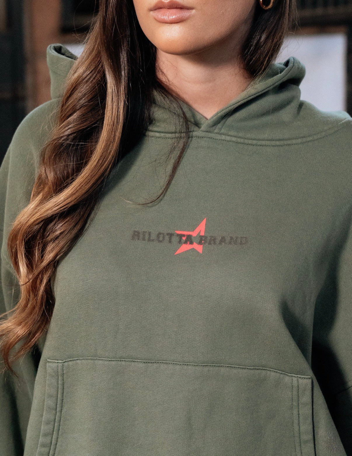 HOODIE WHISTLER VERDE Y NARANJA FLUOR