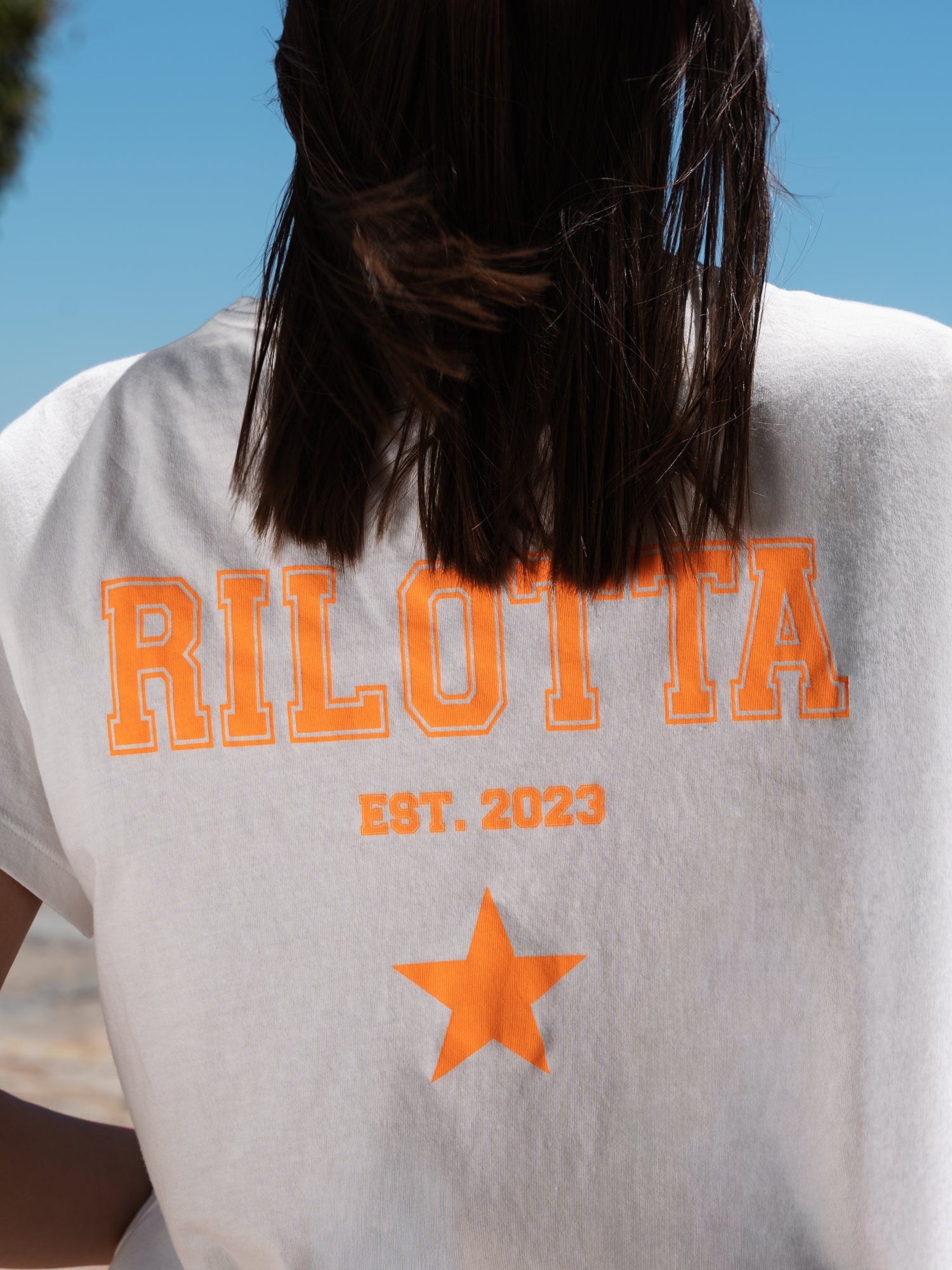 CAMISETA RILOTTA NARANJA FLÚOR BLANCA