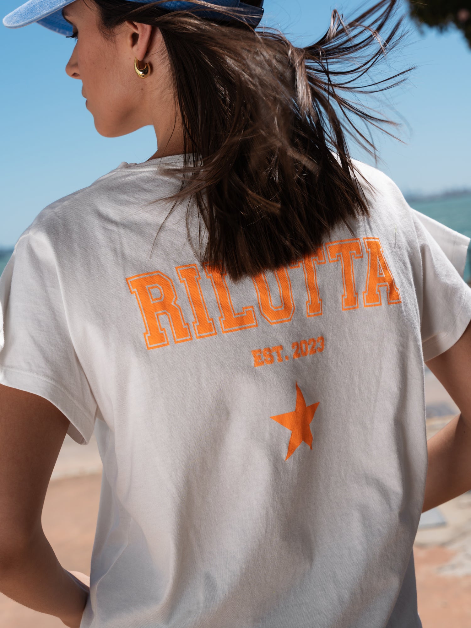 CAMISETA RILOTTA NARANJA FLÚOR BLANCA